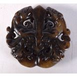 A CHINESE CARVED HARDSTONE PENDANT. 54 grams. 5 cm x 5 cm.