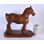 A LARGE 1950S CARVED OAK FIGURE OF A STANDING HORSE in the manner of Robert Mouseman. 30 cm x 27 cm.