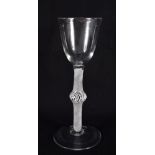 AN ANTIQUE WINE GLASS. 16 cm high.