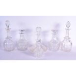 SIX ANTIQUE GLASS DECANTERS AND STOPPERS. Largest 34 cm high. (6)