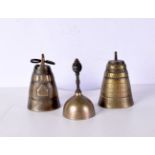 two early brass cattle bells together with another brass bell 17 cm (3).