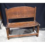 An Arts and Crafts oak bench seat 86 x 91 x 38 cm.