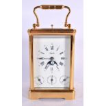 AN ANGELUS REPEARTING MOON PHASE CARRIAGE CLOCK. 17 cm high inc handle.