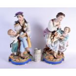 A HUGE PAIR OF 19TH CENTURY FRENCH BISQUE PORCELAIN FIGURES modelled with children. 46 cm x 14 cm.
