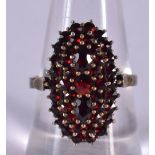 A VINTAGE GARNET RING. 4.4 grams. Q.