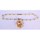 AN ANTIQUE BAVARIAN CARVED BONE NECKLACE. 37 cm long, pendant 4.25 cm x 3.25 cm.