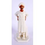 A ROYAL WORCESTER PORCELAIN FIGURE OF AN INDIAN MALE. 17 cm high.