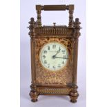 AN ANTIQUE REPEATING FRENCH BRASS CARRIAGE CLOCK. 18 cm high.