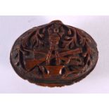 A LATE 18TH CENTURY CONTINENTAL CARVED COQUILLA NUT SNUFF BOX depicting arms. 6.75 cm x 4 cm.