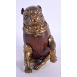 A 19TH CENTURY EUROPEAN CARVED WOOD BRONZE INKWELL in the form of a dog. 15 cm x 8 cm.