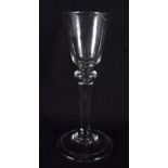 AN ANTIQUE WINE GLASS. 16 cm high.