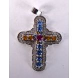 A SILVER MULTI STONE CROSS. 8.5 grams. 5 cm x 3 cm.