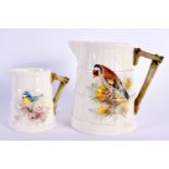 Royal Worcester barrel shaped jug painted with a Goldfinch and another small jug painted with a Blue