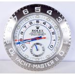 A Contemporary Rolex dealership style wall clock 34 cm.