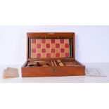 An antique mahogany compendium games box 10 x 39 x 22 cm