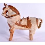 A CONTINENTAL FOLK ART PRIMITIVE POTTERY FIGURE OF A HORSE. 24 cm x 22 cm.