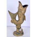 A Tribal bronze drinking vessel in the form of a male carrying a fish 31 cm.