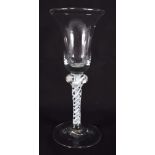 AN ANTIQUE WINE GLASS. 17 cm high.