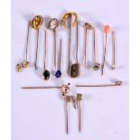 A COLLECTION OF GOLD AND YELLOW METAL HAT PINS. 23.1 grams. 8 cm long. (qty)