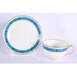Late 19th century Minton teacup and saucer painted with a turquoise band decorated in the style of C
