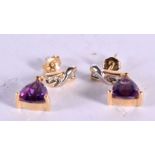 A PAIR OF 14CT GOLD AND AMETHYST EARRINGS. 3 grams. 2 cm x 0.75 cm.