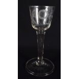 AN ANTIQUE WINE GLASS. 14 cm high.