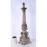 A large metal column lamp stand decorated with cherubs 61 cm .