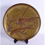 A LARGE 19TH CENTURY JAPANESE MEIJI PERIOD BRONZE DISH decorated in relief with birds. 29 cm diamete