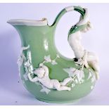 Minton celadon and white parian mermaid ewer each side moulded with a putto holding leafy branches,