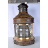 An antique ships masthead light 58 x 32 cm.