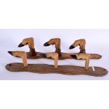 A PAIR OF EDWARDIAN TAXIDERMY DEER FOOT COAT RACKS. 50 cm long.