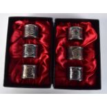 SIX MODERN SILVER NAPKIN RINGS. 230 grams. 4.5 cm diameter. (6)