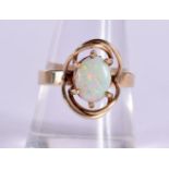A 9CT GOLD RING SET WITH AN OPAL. Size Q, weight 2.6g