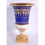 AN EARLY 19TH CENTURY FRENCH EMPIRE PORCELAIN URN painted with gilt motifs. 20 cm x 12 cm.