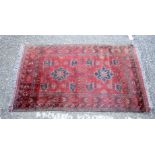 An Afghan rug 160 x 100cm.