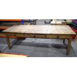 A large 3 drawer antique farmhouse style planked pine table 77 x 225 x 81 cm.