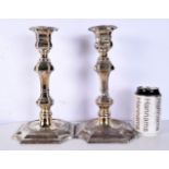 A LARGE PAIR OF ANTIQUE SILVER PLATED CANDLESTICKS. 27 cm high.