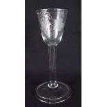 AN ANTIQUE WINE GLASS. 15 cm high.