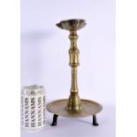 AN 18TH/19TH CENTURY MIDDLE EASTERN INDIAN BRONZE CANDLESTICK. 32 cm x 12 cm.