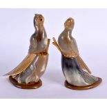 A PAIR OF LATE 19TH CENTURY MIDDLE EASTERN CARVED BUFFALO HORN FIGURES modelled as birds. 12 cm high