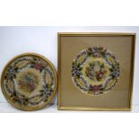 A pair of framed antique embroidered panels of flowers 28 cm (2).