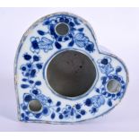 A RARE 17TH CENTURY CHINESE BLUE AND WHITE HEART SHAPED INKWELL Kangxi, painted with flowers and vin