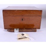 A VINTAGE DUNHILL MAHOGANY CIGAR HUMIDOR together with a cigar. 24 cm x 20 cm.