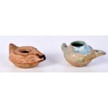 An early glazed Roman style pottery oil lamp together with another pottery oil lamp 5 x 10 cm (2).