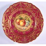 Royal Worcester plate painted with fruit on a claret ground with rich raised gilding by F. Higgins,