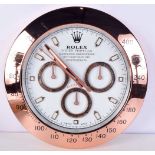 A Contemporary Rolex dealership style wall clock 34 cm.