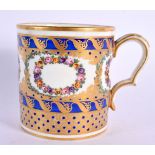 Sevres coffee can painted with wreathes of roses surrounded by an elaborate blue and gilt ground, C