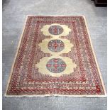 A Khotan style rug 252 x 170 cm.