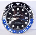 A Contemporary Rolex dealership style wall clock 34 cm.