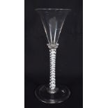 AN ANTIQUE WINE GLASS. 15 cm high.